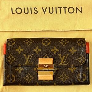 Authentic Louis Vuitton Portefeuille Elysee Monogram Wallet in Clementine